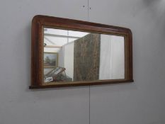 An inlaid overmantel mirror