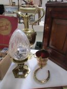 A heavy 19th century brass ewer a/f, a brass lamp with cone glass shade,