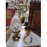 A heavy 19th century brass ewer a/f, a brass lamp with cone glass shade,