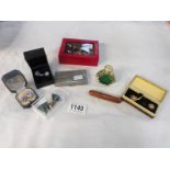 A mixed lot of costume jewellery including cuff links