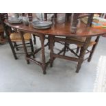 A period oak gate leg table