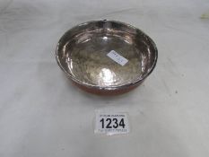 An Indian silver and wood bowl