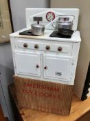 An Amersham toy cooker in original box