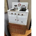 An Amersham toy cooker in original box