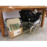 A vintage dolls pram, dolls cot,