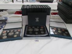 15 cased British coin proof collection and Millennium collection
