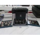 15 cased British coin proof collection and Millennium collection