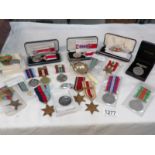 A quantity of WW2 medals,