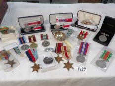 A quantity of WW2 medals,