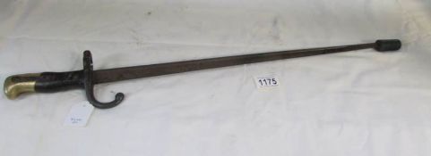 A French model 1874 'Gras' sword bayonet marked on the back edge Mre D'Armes De St.