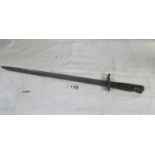 A Remington bayonet (markings mostly worn)