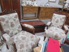 A pair of Edwardian arm chairs