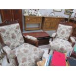 A pair of Edwardian arm chairs