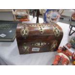 A tea caddy with ivory mounts