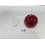 A ruby glass paperweight and a glass owl paperweight