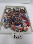 A quantity of old necklaces including some silver