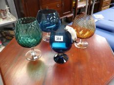 4 large coloured glass brandy balloons,