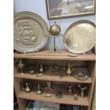 3 shelves of brass ware