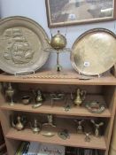 3 shelves of brass ware