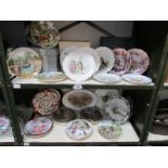 2 shelves of collector's plates
