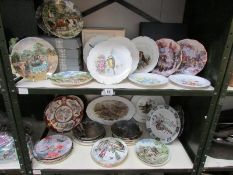 2 shelves of collector's plates