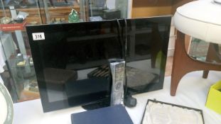 A Tecnik flat screen television