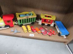 A mixed lot of toys including Fisher Price