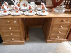 A pine double pedestal desk