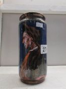 A 19th century Italian vase hand painted with a pharmacist figure