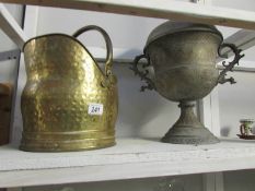 A brass scuttle and a large lidded urn