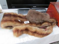 A fox fur stole and a fur hat