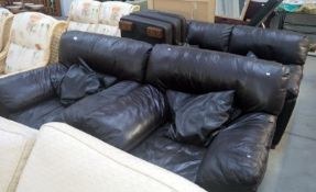 A brown leather 3 piece suite with matching stool