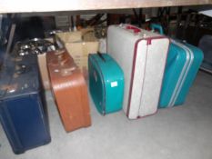 5 vintage suitcases