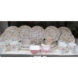 17 Churchill China plates, 6 mugs, a Royal Winton sugar bowl,