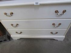 A white 3 drawer chest