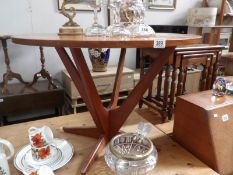 A teak occasional table