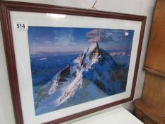 A framed and glazed mountain scene