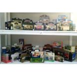 In excess of 60 boxed model vehicles including Lledo, Vanguard, Matchbox, Maisto,