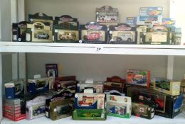 In excess of 60 boxed model vehicles including Lledo, Vanguard, Matchbox, Maisto,