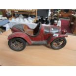 A large scale model of a vintage car