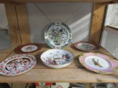 A mixed lot of plates including 19th century hand enamelled,