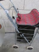 A 4 wheel shopping trolley