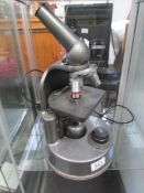 An electric triple view microscope