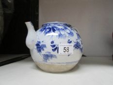 A large 19th century oriental blue and white tea pot