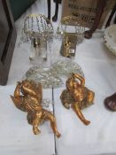 A pair of wall lights, cherubs,