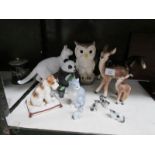 A mixed lot of animal figures including owl, panda, horse,