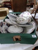 A box of assorted plates and tureens