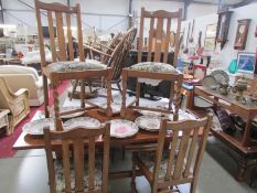 A set of 4 oak dining chairs with barley twist legs