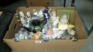 A box of miscellaneous china teapots etc