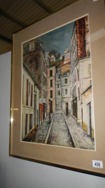 A framed and glazed continental street scene